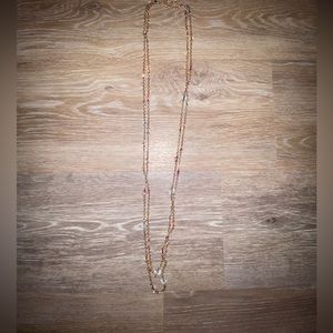 Long layered clear colored beaded necklace